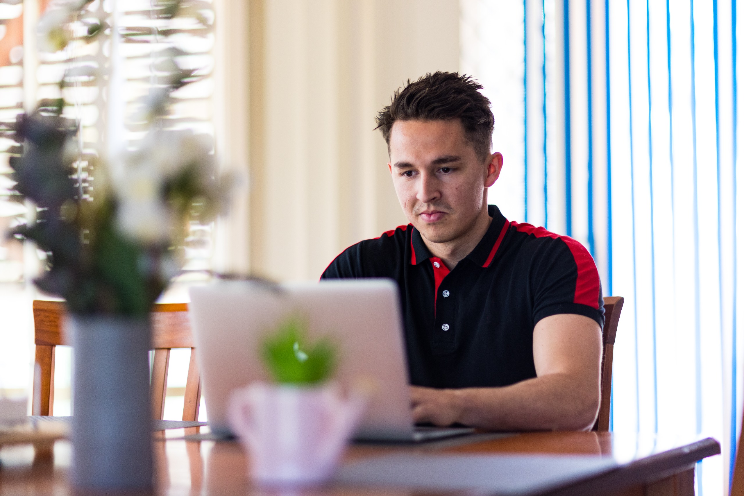 Customer watching webinar on laptop